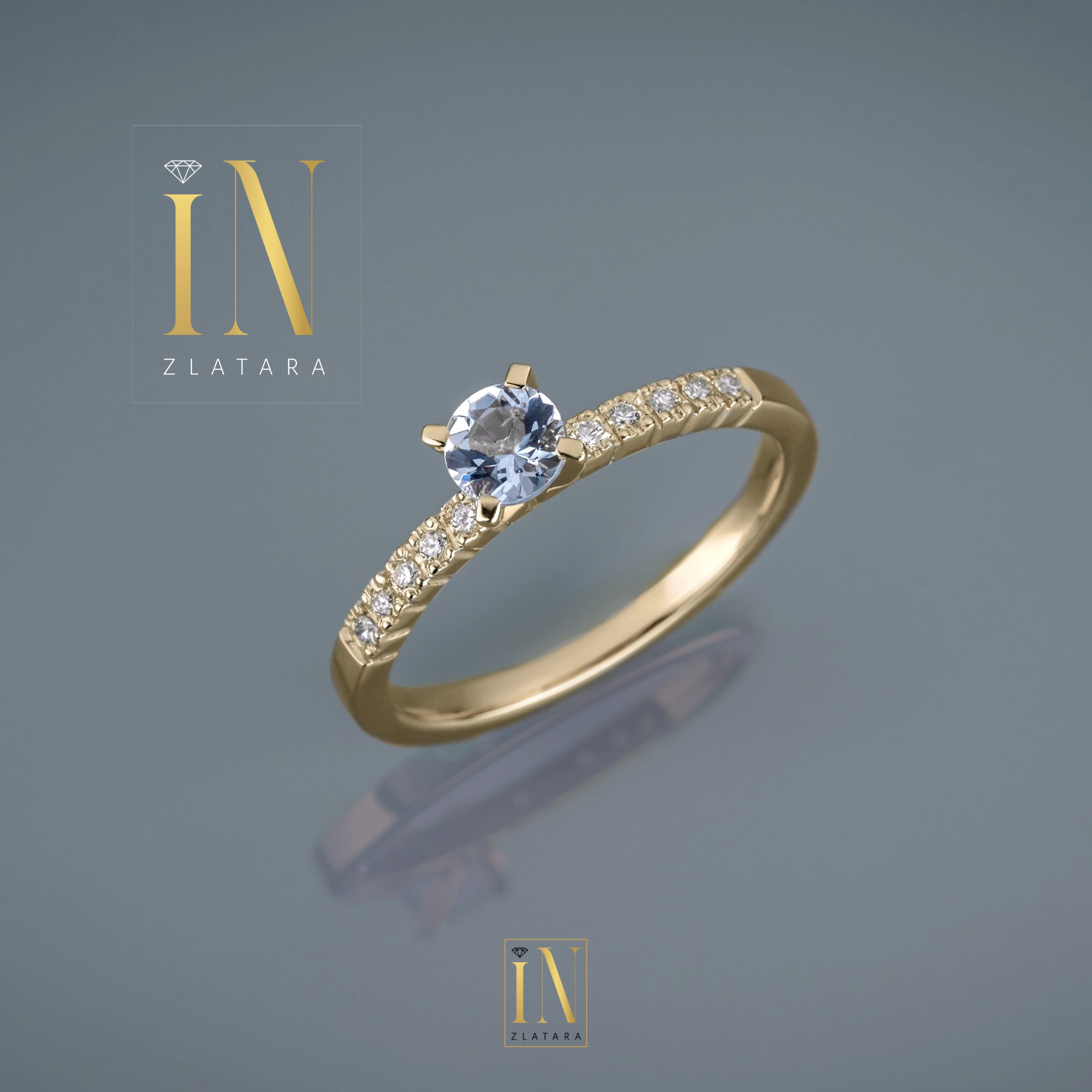 Prsten od žutog zlata sa centralnim akvamarinom i brilijantima A156